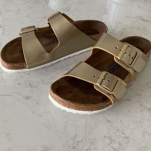 Gold Arizona Birkenstock’s size 36
